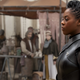 Reva stands on a Tatooine street in Obi-Wan.